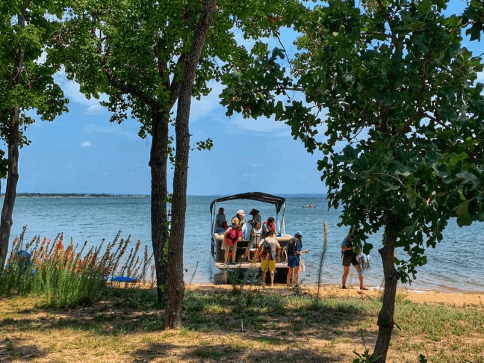 Image of guests who rented the Pontoon Boat at our Texas Hill Country cabins Lake Resort! at