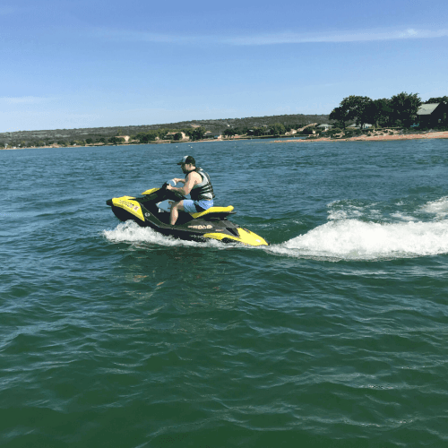 Image of guest on their jet ski rental. Offered daily for the use of Willow Point guests!