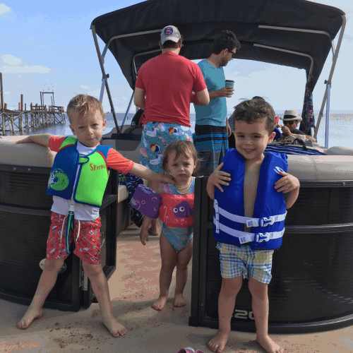 Image of guests renting our pontoon boat. Available daily for guests of Willow Point Resort on Lake Buchanan in the Texas Hill Country.